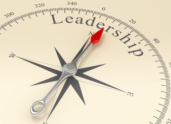 compass pointing toward N with word leadership
